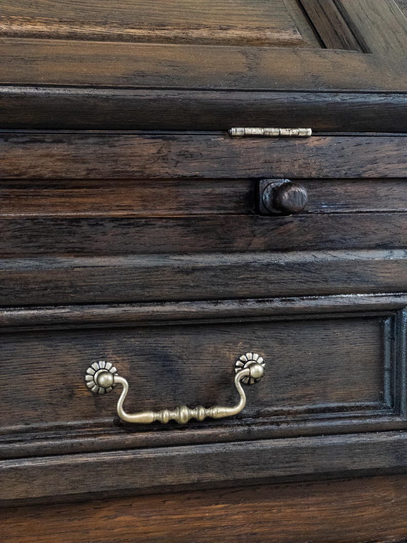 schwazre massivholz kommode